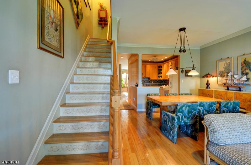404 Manchester Drive Nutley, NJ 07110 - Photo 12 of 26 a view of living room with furniture and wooden floor