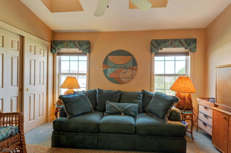 404 Manchester Drive Nutley, NJ 07110 - Photo 21 of 26 a living room with furniture and a window
