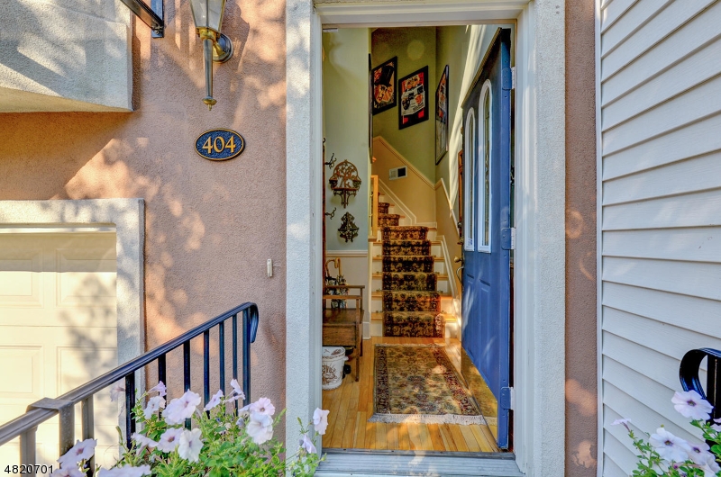 404 Manchester Drive Nutley, NJ 07110 - Photo 3 of 26 a view of a door and wooden floor