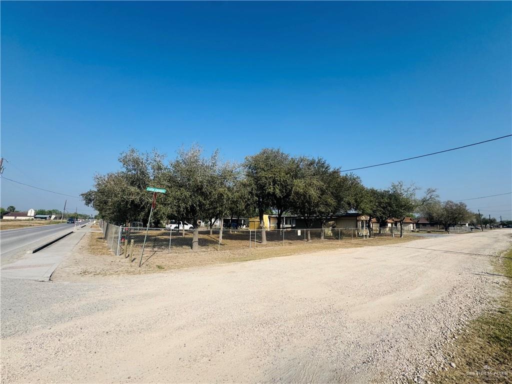 8007 Tex Mex Road Edinburg, TX 78542 - Photo 24 of 24 a swimming pool with outdoor seating and yard