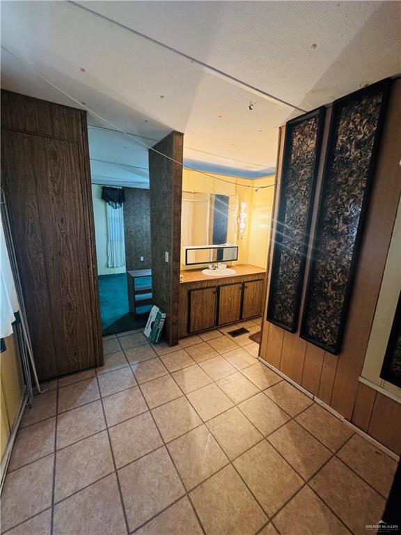 8007 Tex Mex Road Edinburg, TX 78542 - Photo 10 of 24 a view of a kitchen with cabinets and glass door