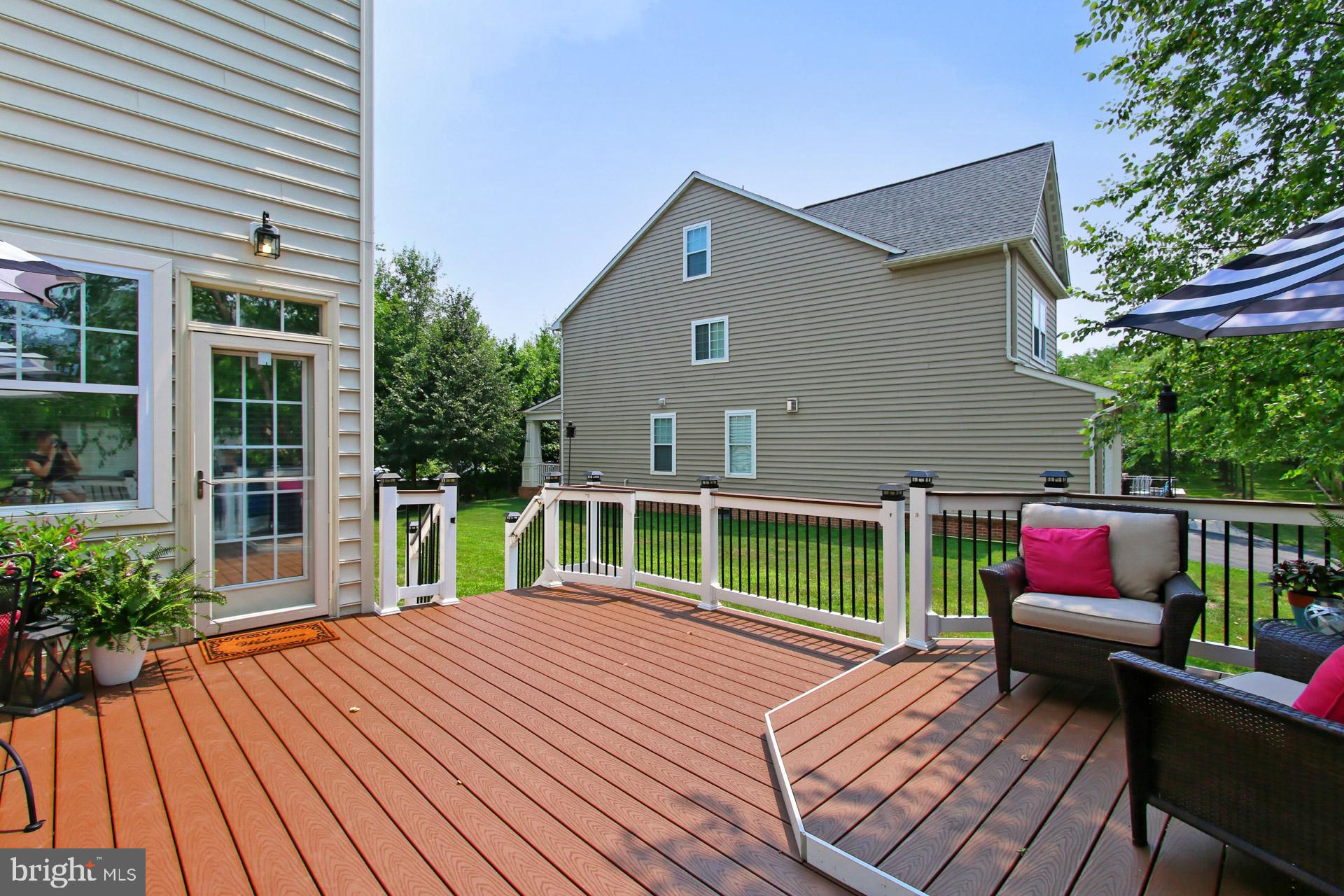23106 Bronstein Lane Brambleton, VA 20148 - Photo 19 of 58 Enjoy the Stairs to the Side yard