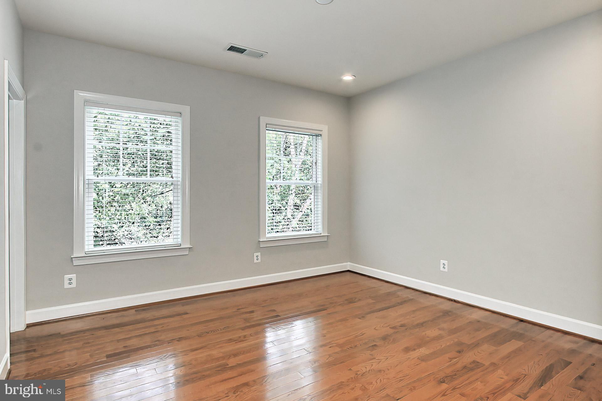 23106 Bronstein Lane Brambleton, VA 20148 - Photo 24 of 58 Bed #2 w/ New Hardwood Floors+ Rec Lights+ WI Clst