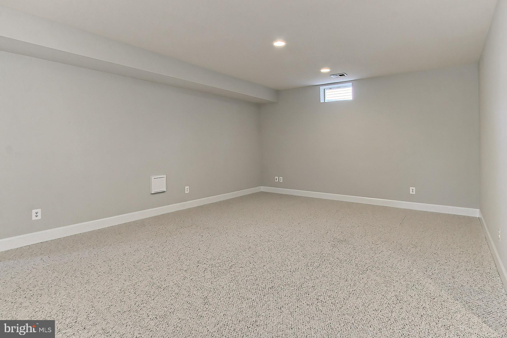 23106 Bronstein Lane Brambleton, VA 20148 - Photo 30 of 58 Finished LL Rec Room w/ Rec Lights, 9'+ Clgs