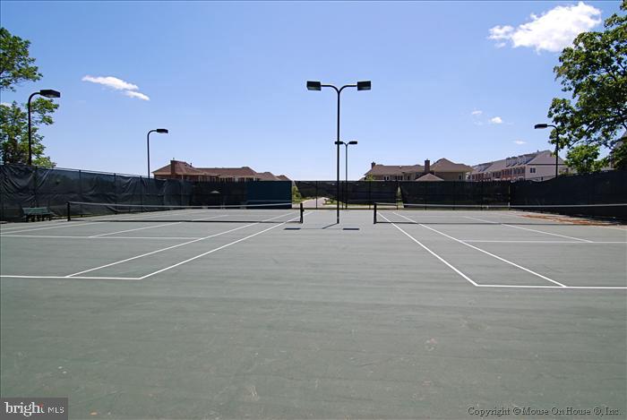 23106 Bronstein Lane Brambleton, VA 20148 - Photo 47 of 58 Walk To the Tennis Courts with Lights