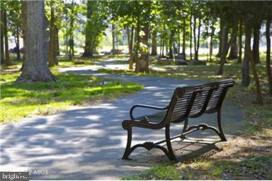 23106 Bronstein Lane Brambleton, VA 20148 - Photo 53 of 58 Enjoy Miles of Paved Trails, Shady Spots +Benches