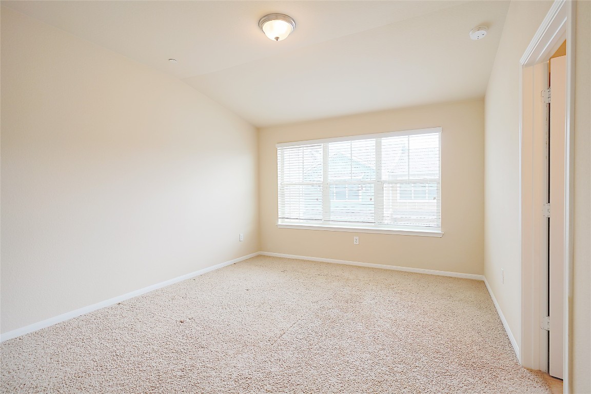 516 East Slaughter Lane, Unit 801 Austin, TX 78744 - Photo 11 of 16 an empty room with a window