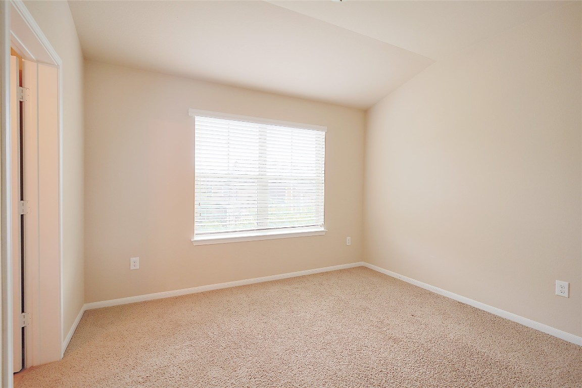 516 East Slaughter Lane, Unit 801 Austin, TX 78744 - Photo 13 of 16 an empty room with a window