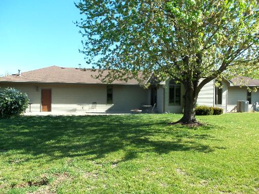 55 Grandin Road Morris, IL 60450 - Photo 15 of 16 a front view of a house with a yard