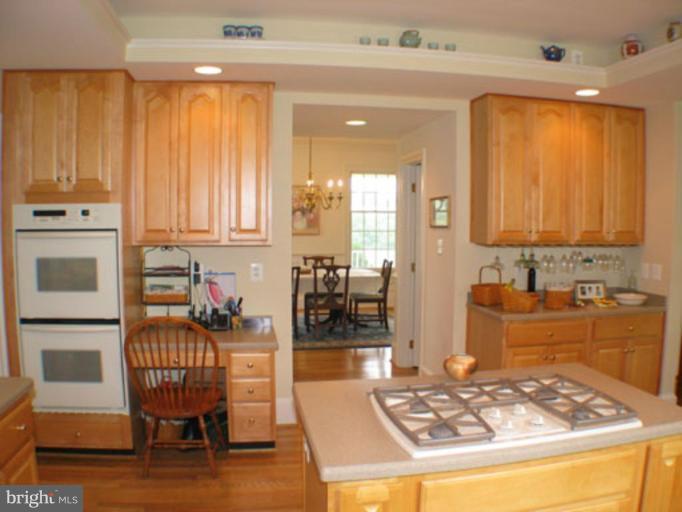 17615 Dry Mill Road Leesburg, VA 20175 - Photo 8 of 30 Kitchen with Desk & Under Cabinet Stemware Holders