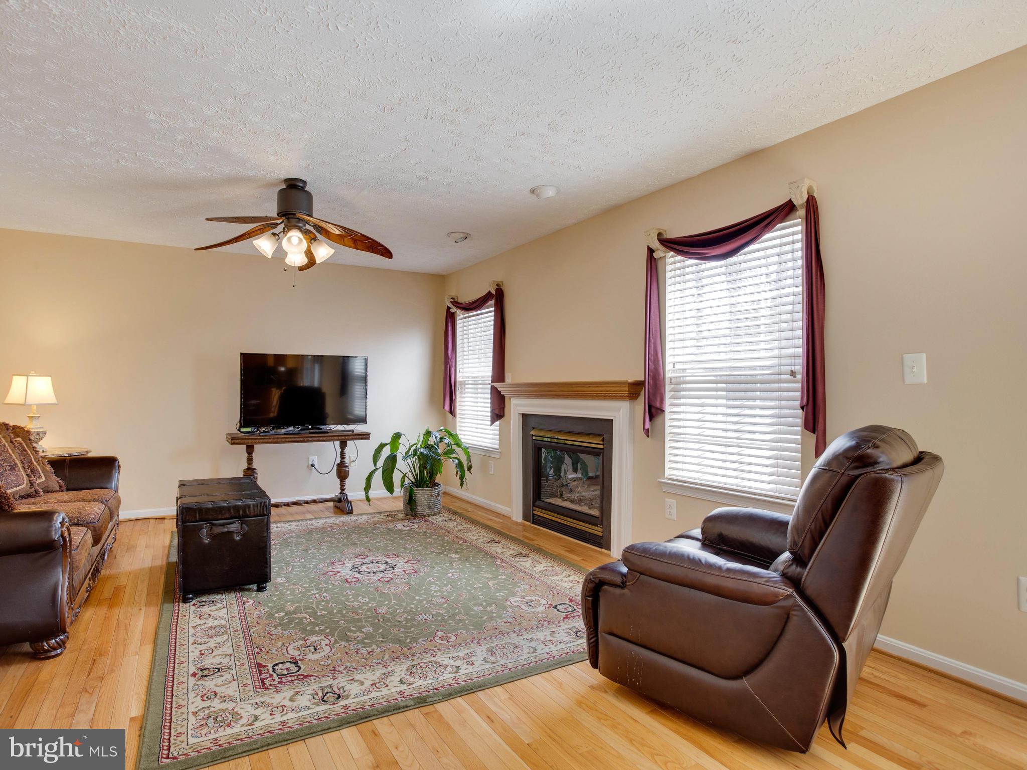 2325 Golden Chapel Road Odenton, MD 21113 - Photo 6 of 51 really large family room with gas fireplace