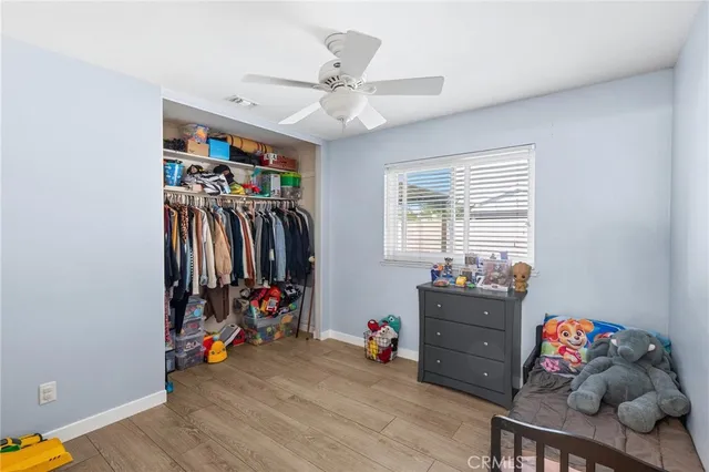 a view of a room with toys and stairs