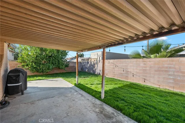 a view of backyard with green space