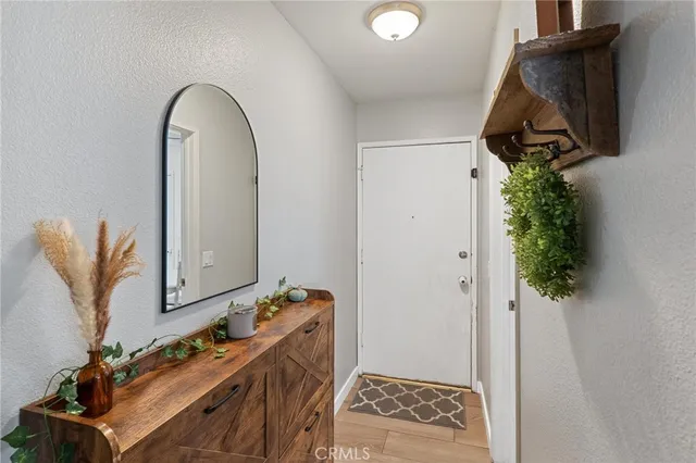 a bathroom with a mirror and a sink