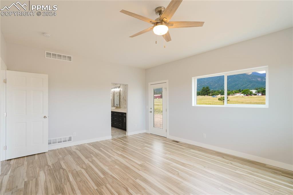 8081 Granger Road Rye, CO 81069 - Photo 16 of 42 a view of empty room with wooden floor