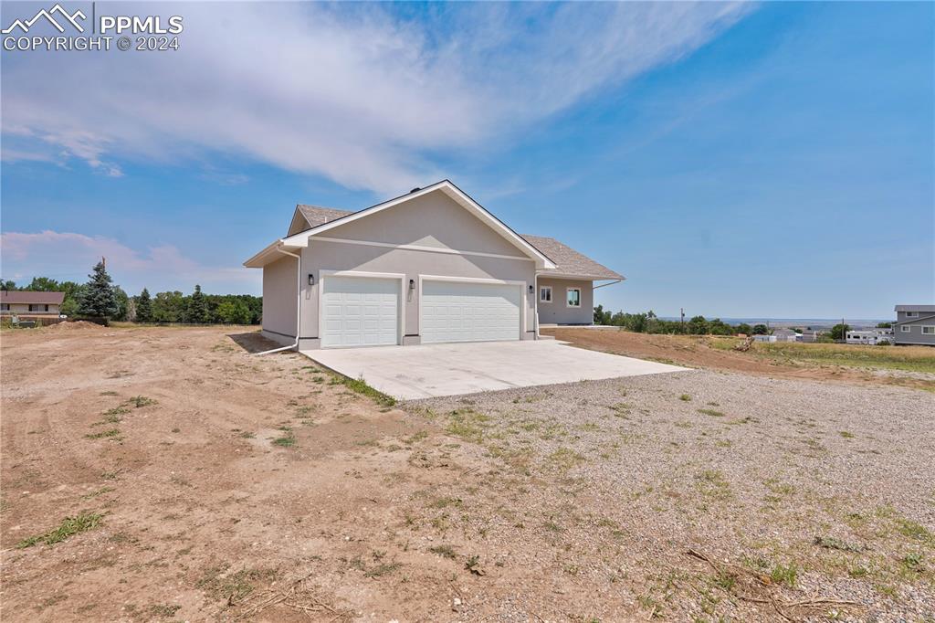 8081 Granger Road Rye, CO 81069 - Photo 2 of 42 a view of a house with a yard and mountain view in back