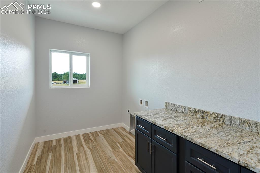 8081 Granger Road Rye, CO 81069 - Photo 23 of 42 a view of a kitchen that shows a sink wooden floor and a window
