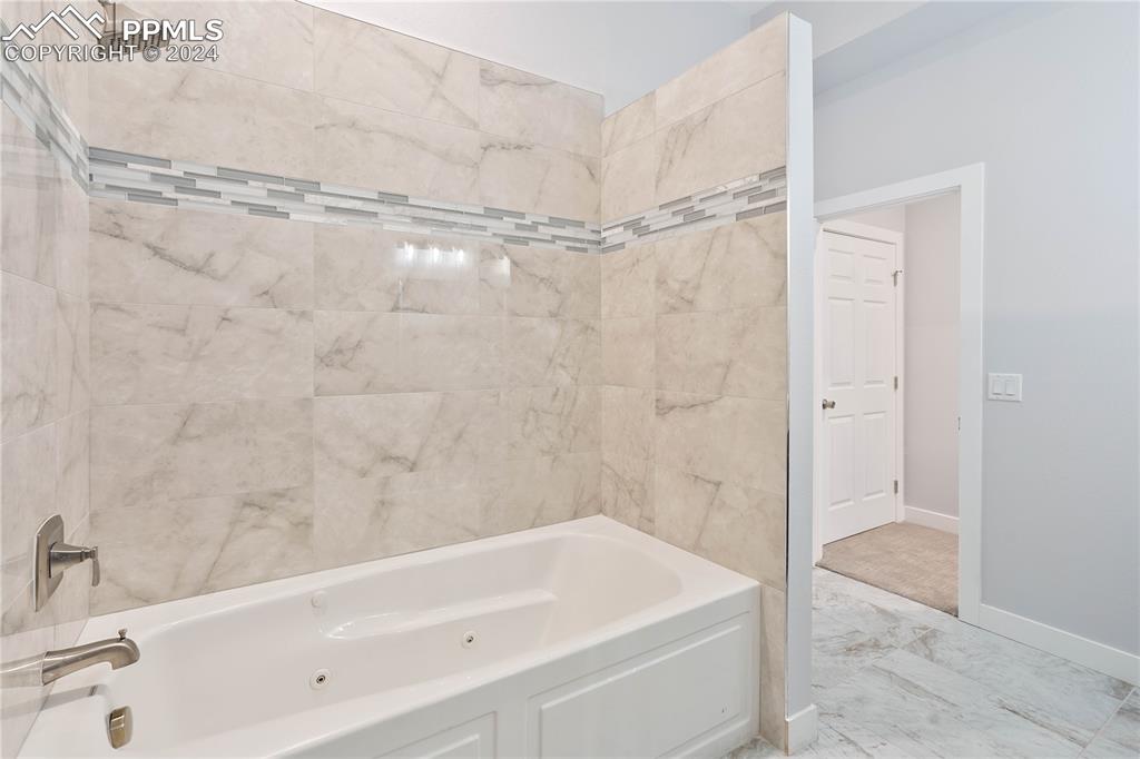 8081 Granger Road Rye, CO 81069 - Photo 39 of 42 a bathroom with a bathtub and a shower