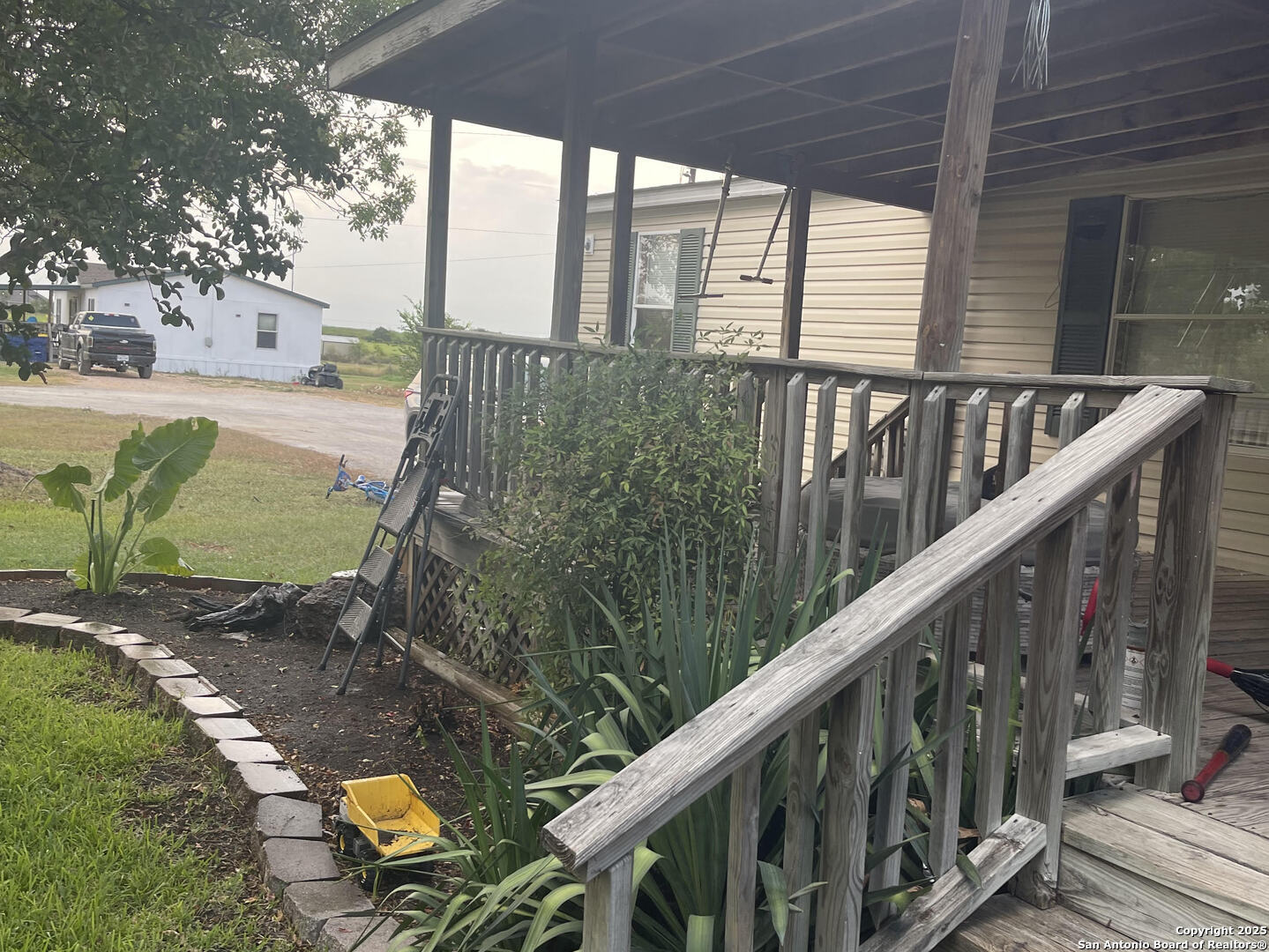 6940 Green Valley Road Schertz, TX 78108 - Photo 1 of 17 a view of balcony with wooden floor
