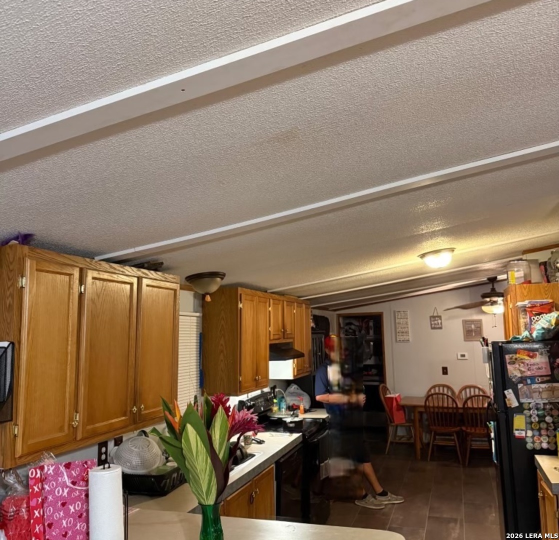 6940 Green Valley Road Schertz, TX 78108 - Photo 9 of 17 a room with furniture and a window