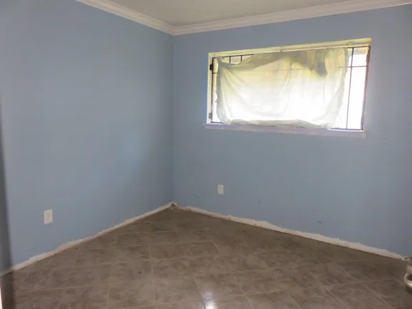 an empty room with a window