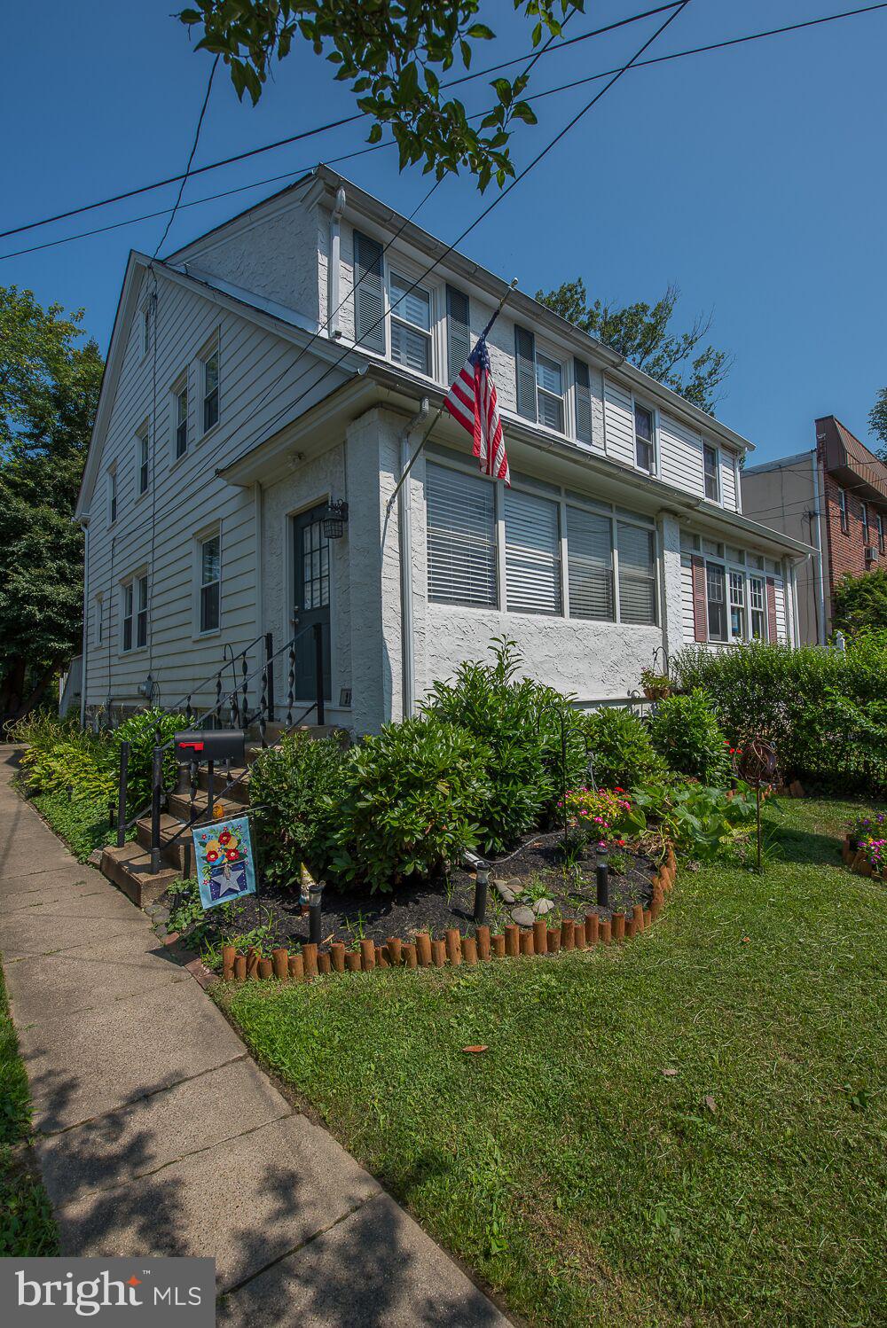 216 Rockingham Road Bryn Mawr, PA 19010 - Photo 2 of 27 a front view of house with yard and green space