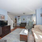 216 Rockingham Road Bryn Mawr, PA 19010 - Photo 6 of 27 a living room with furniture and a flat screen tv