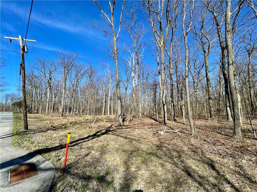 13-14 15 16 Laurel Summit Road Boswell, PA 15531 - Photo 24 of 46 a view of a backyard with wooden fence