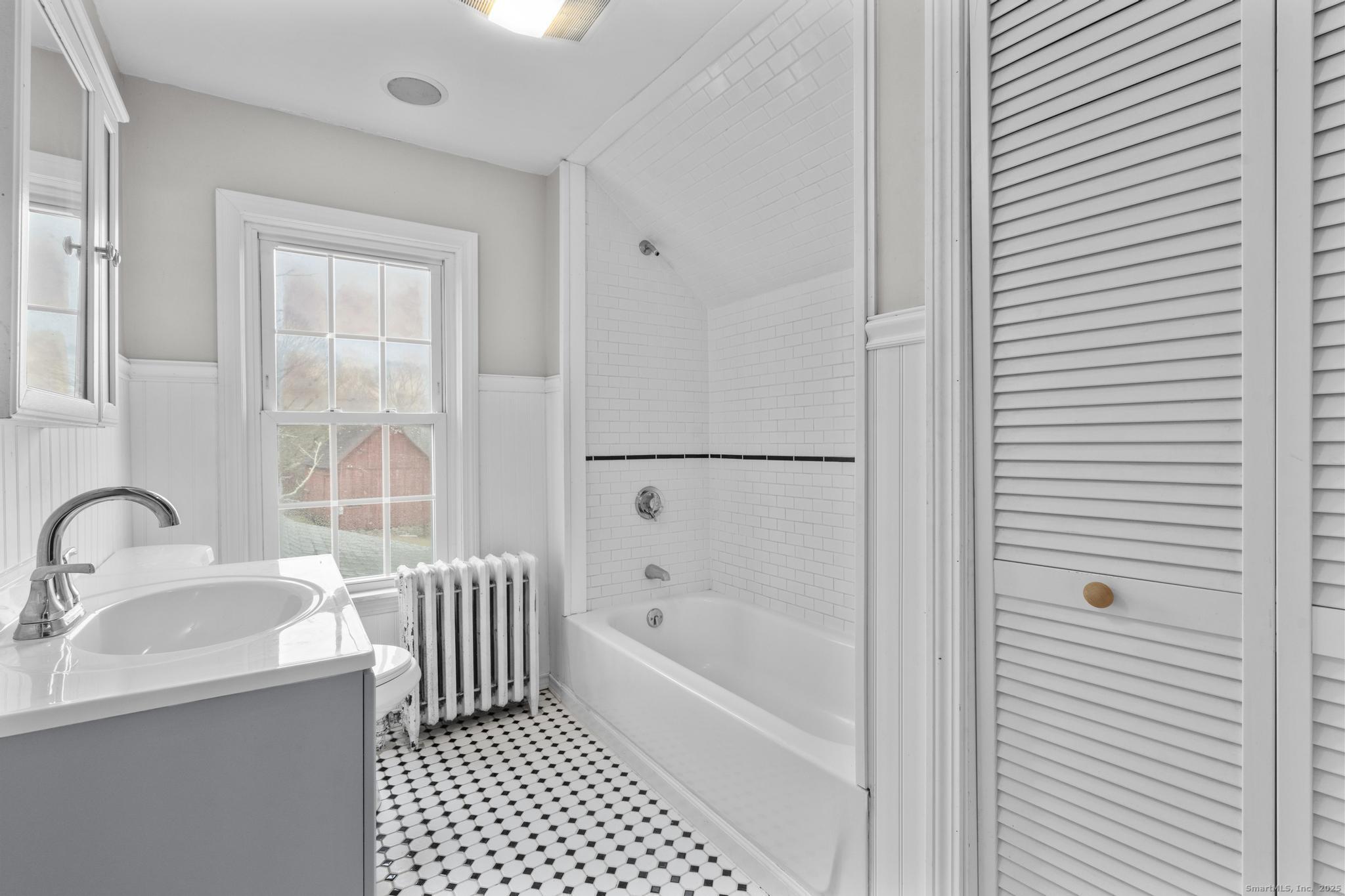 162 Scotland Road Windham, CT 06280 - Photo 12 of 31 a bathroom with a bathtub and a sink