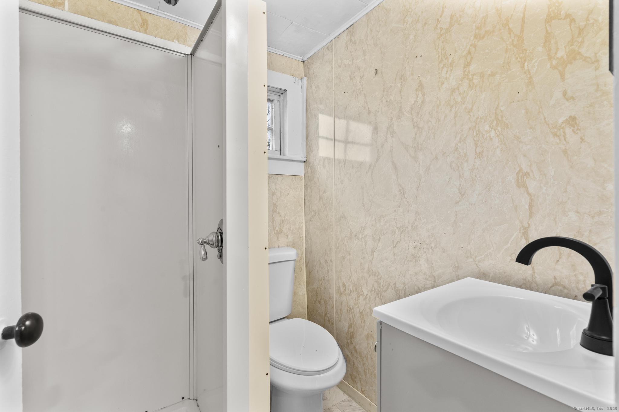 162 Scotland Road Windham, CT 06280 - Photo 18 of 31 a bathroom with a sink toilet and shower