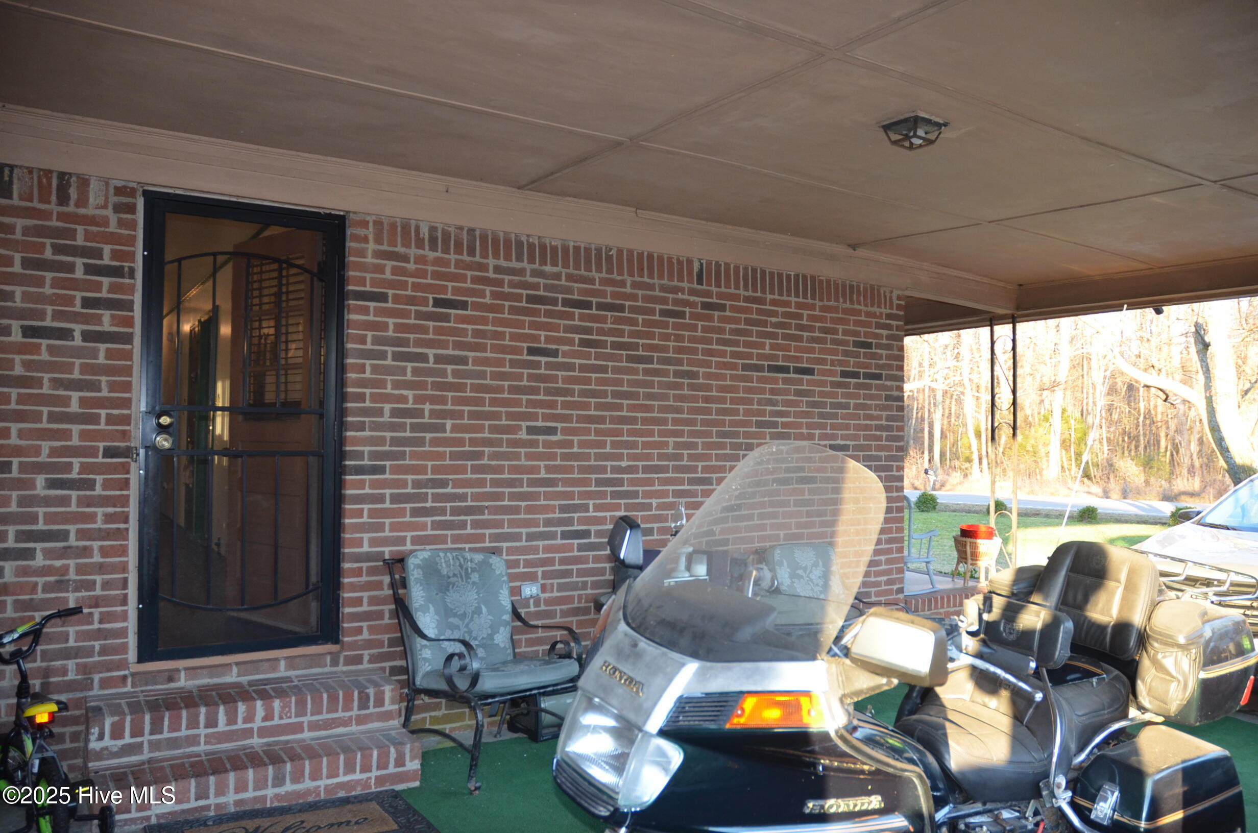 12652 Highway 258 Scotland Neck, NC 27874 - Photo 19 of 26 Covered carport with storage