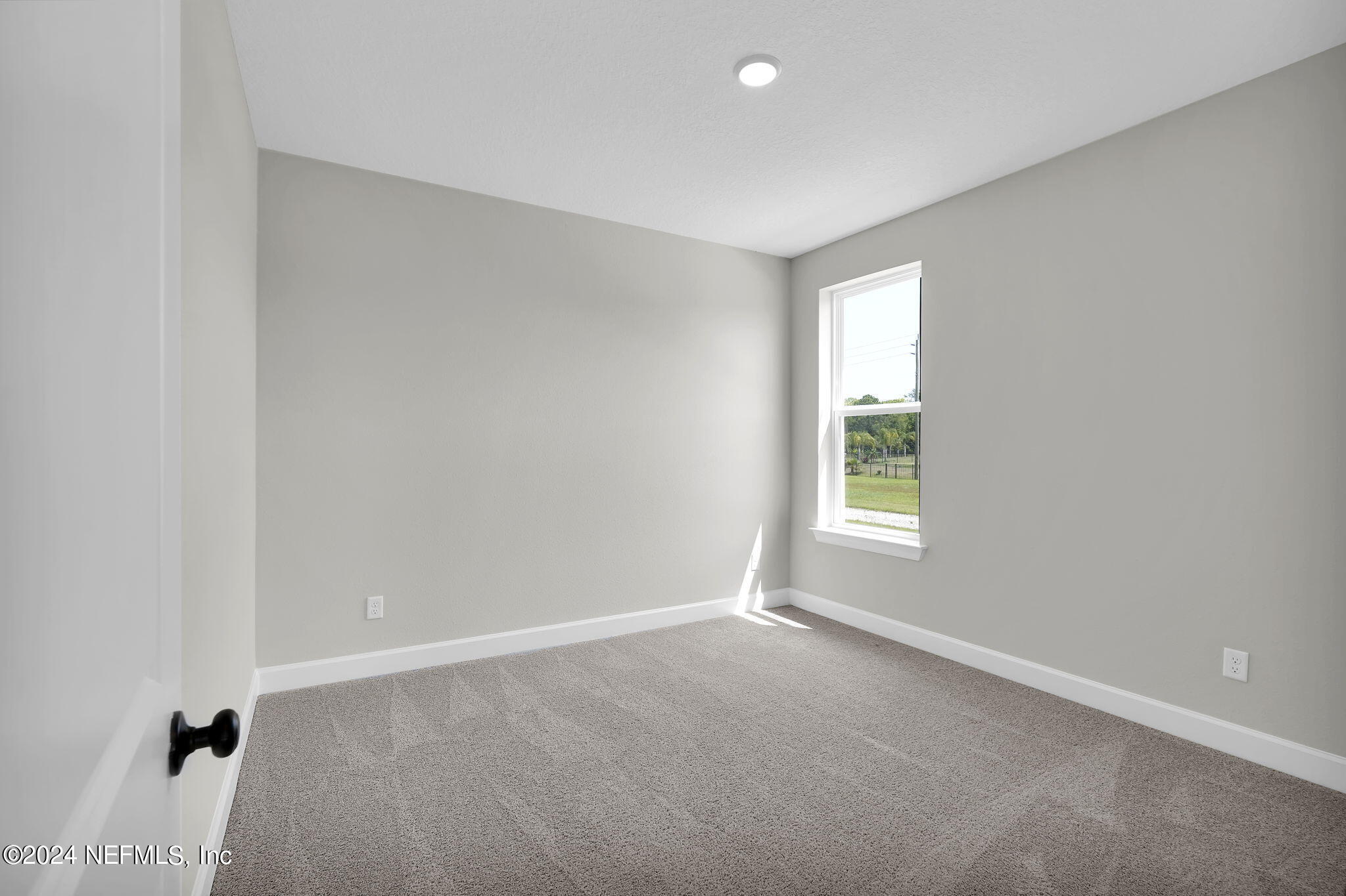 117 Greylock Lane St. Augustine, FL 32092 - Photo 11 of 48 an empty room with a window