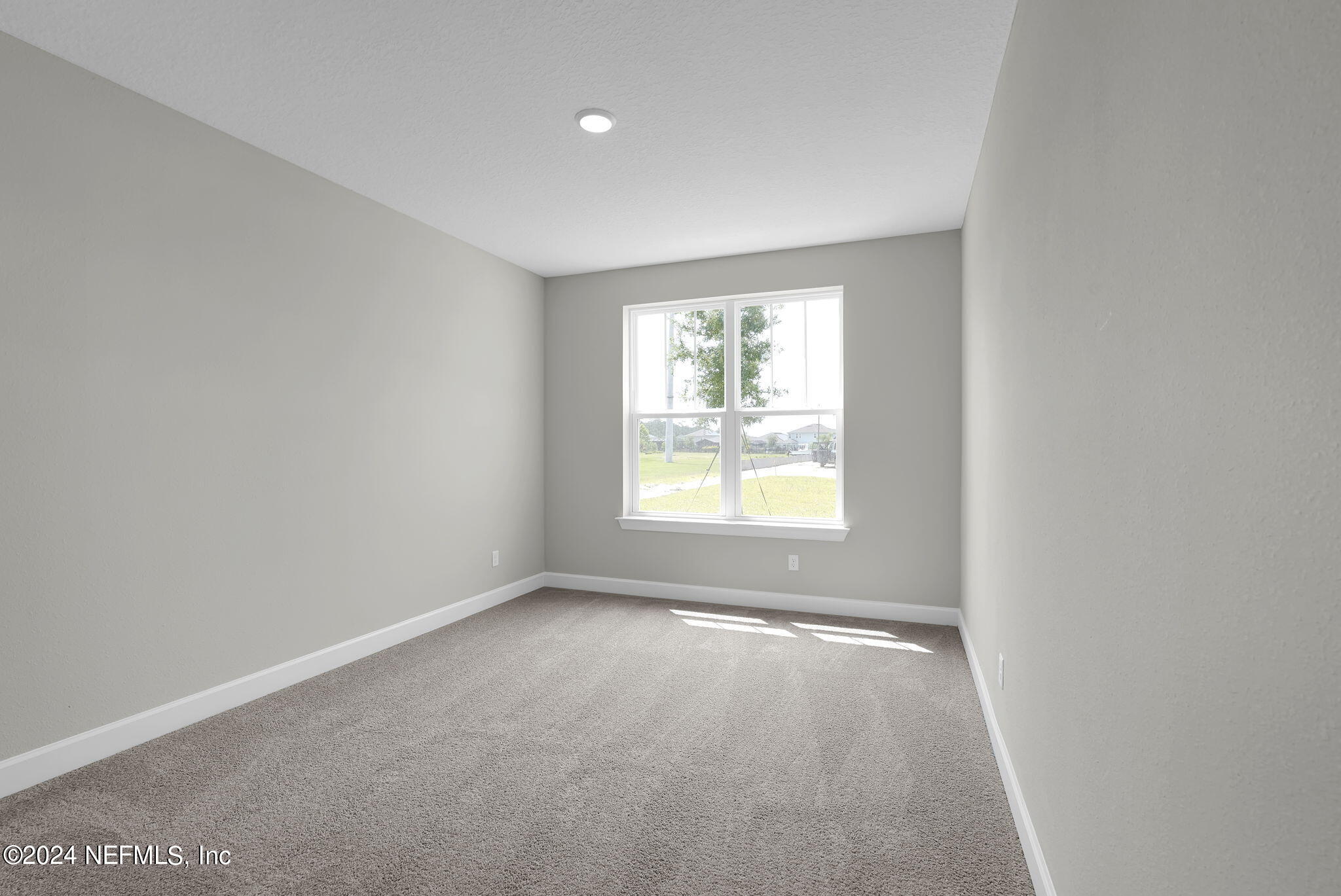 117 Greylock Lane St. Augustine, FL 32092 - Photo 12 of 48 an empty room with windows