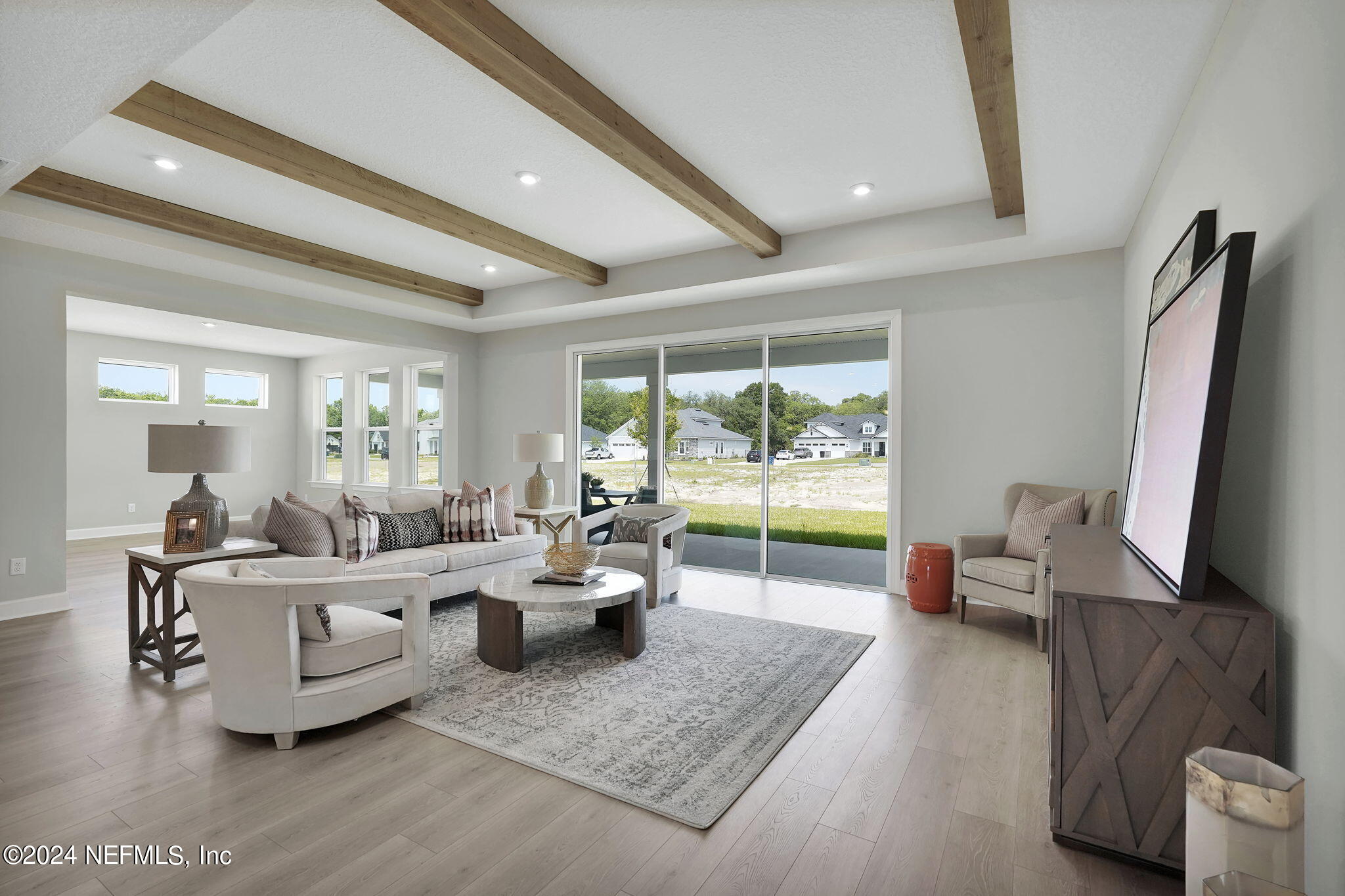 117 Greylock Lane St. Augustine, FL 32092 - Photo 24 of 48 a living room with furniture and a large window
