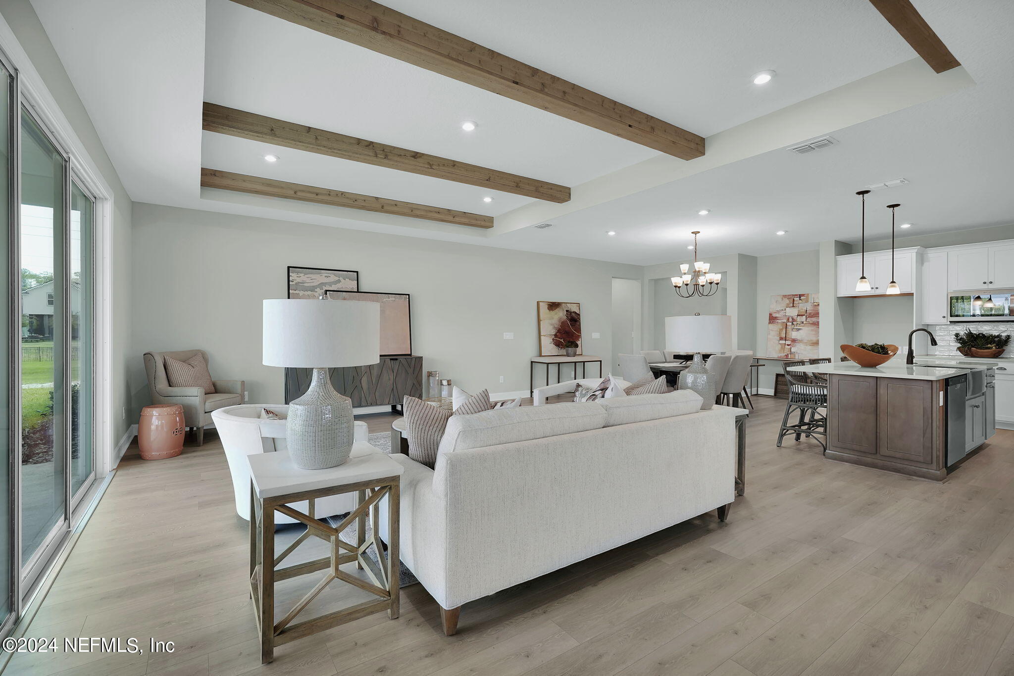 117 Greylock Lane St. Augustine, FL 32092 - Photo 26 of 48 a living room with furniture and a table