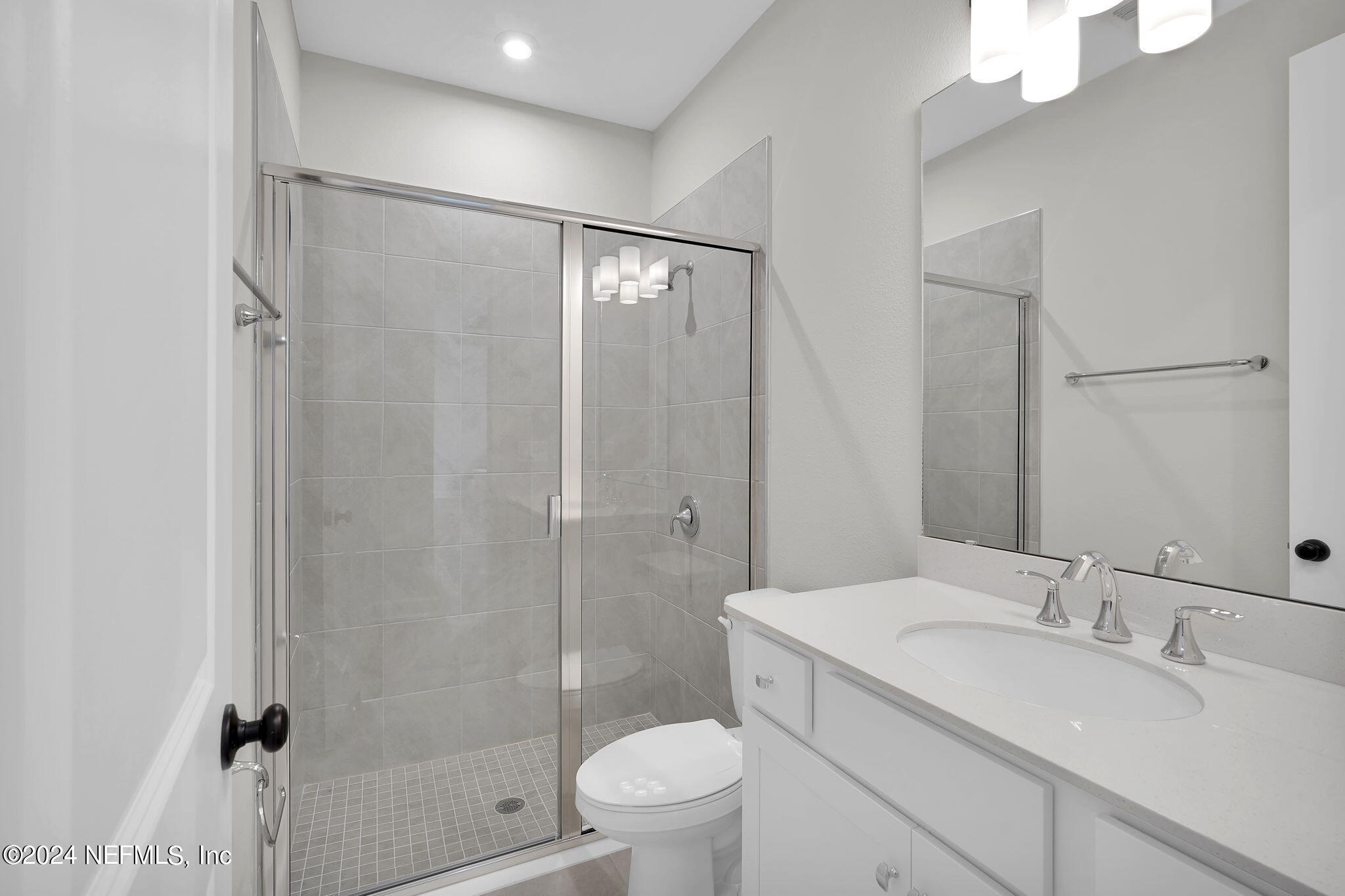 117 Greylock Lane St. Augustine, FL 32092 - Photo 29 of 48 a bathroom with a sink toilet and shower