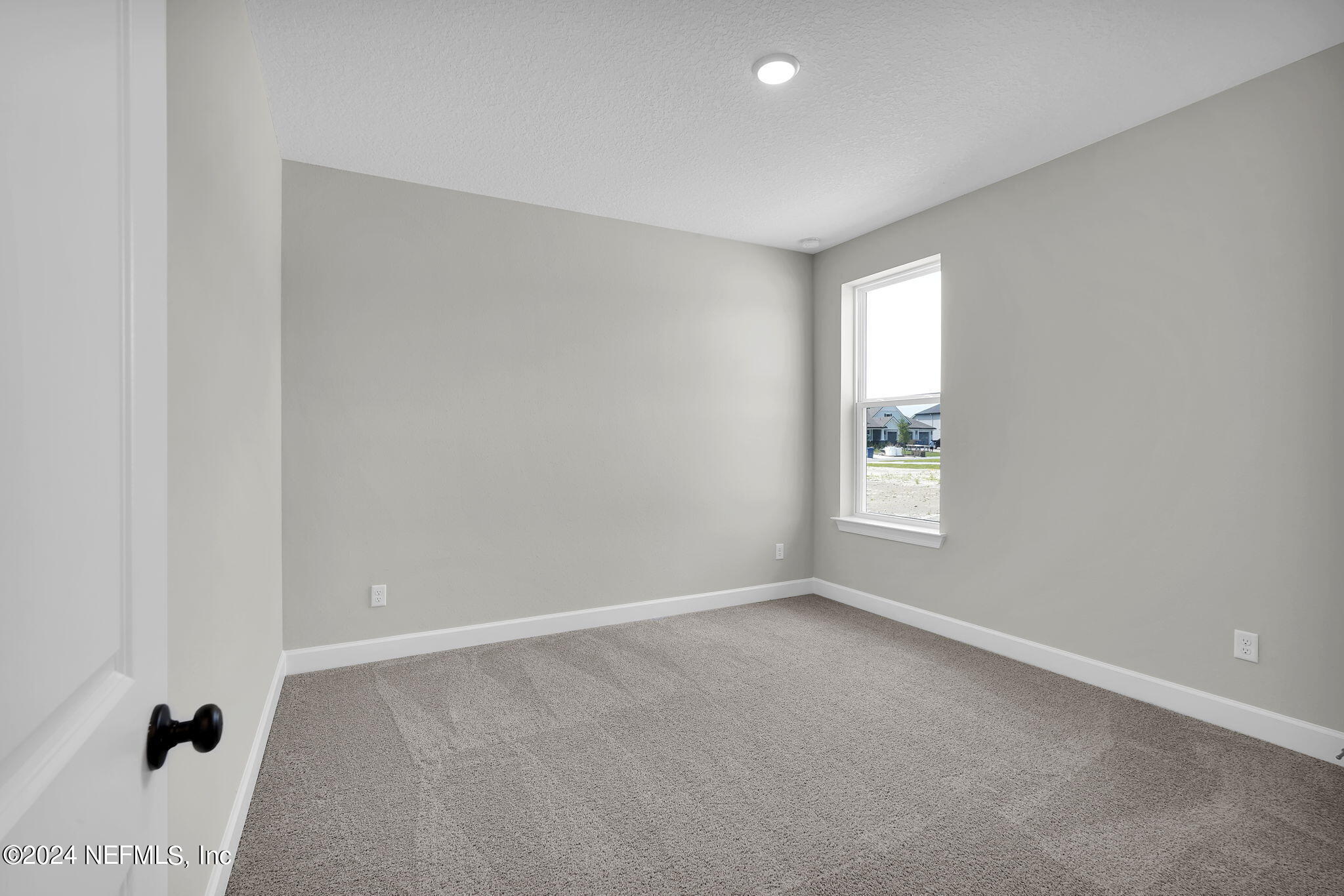 117 Greylock Lane St. Augustine, FL 32092 - Photo 30 of 48 a view of an empty room with a window