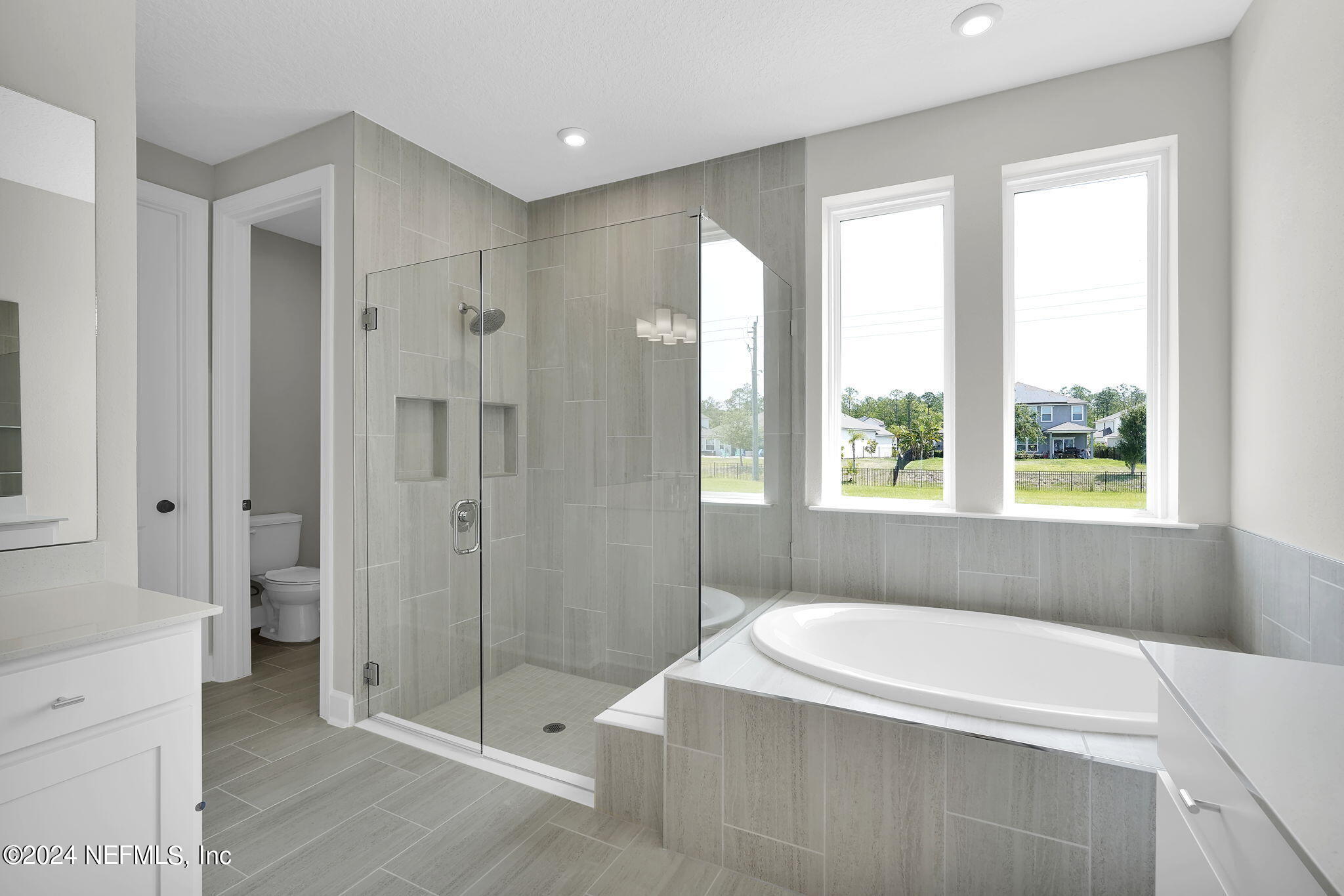 117 Greylock Lane St. Augustine, FL 32092 - Photo 34 of 48 a bathroom with a bathtub and shower