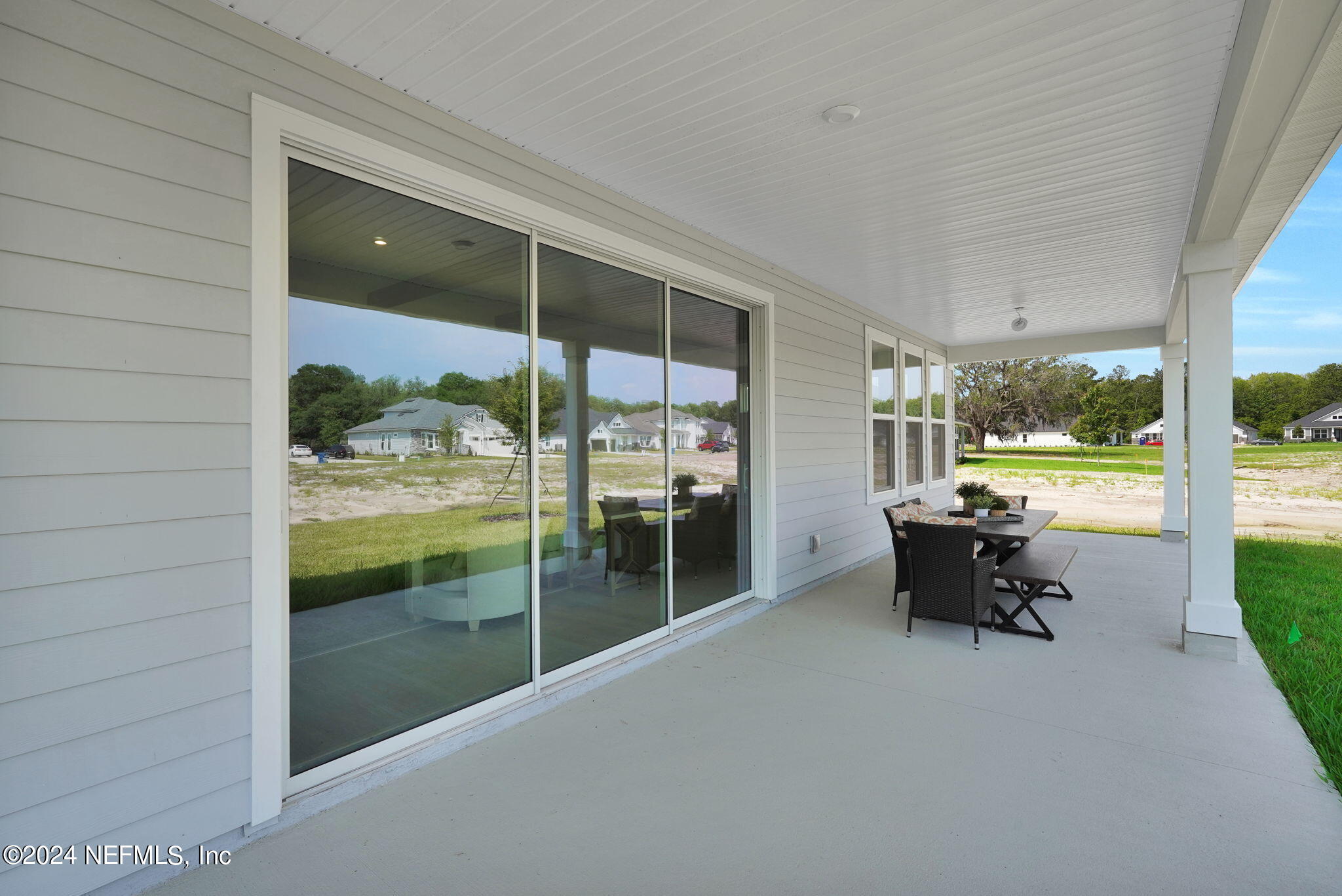 117 Greylock Lane St. Augustine, FL 32092 - Photo 39 of 48 a balcony with furniture and garden view