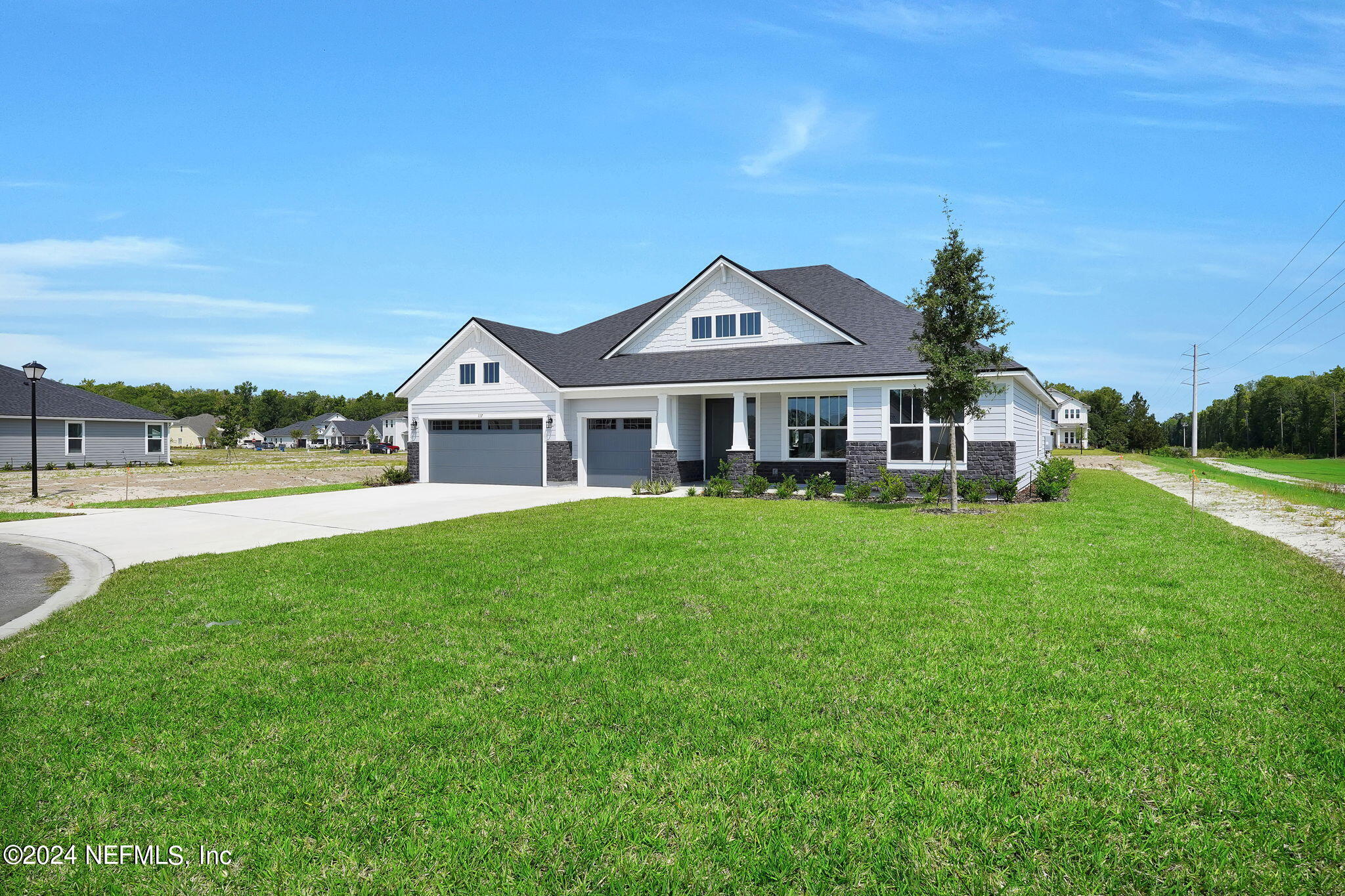 117 Greylock Lane St. Augustine, FL 32092 - Photo 4 of 48 a front view of a house with a yard
