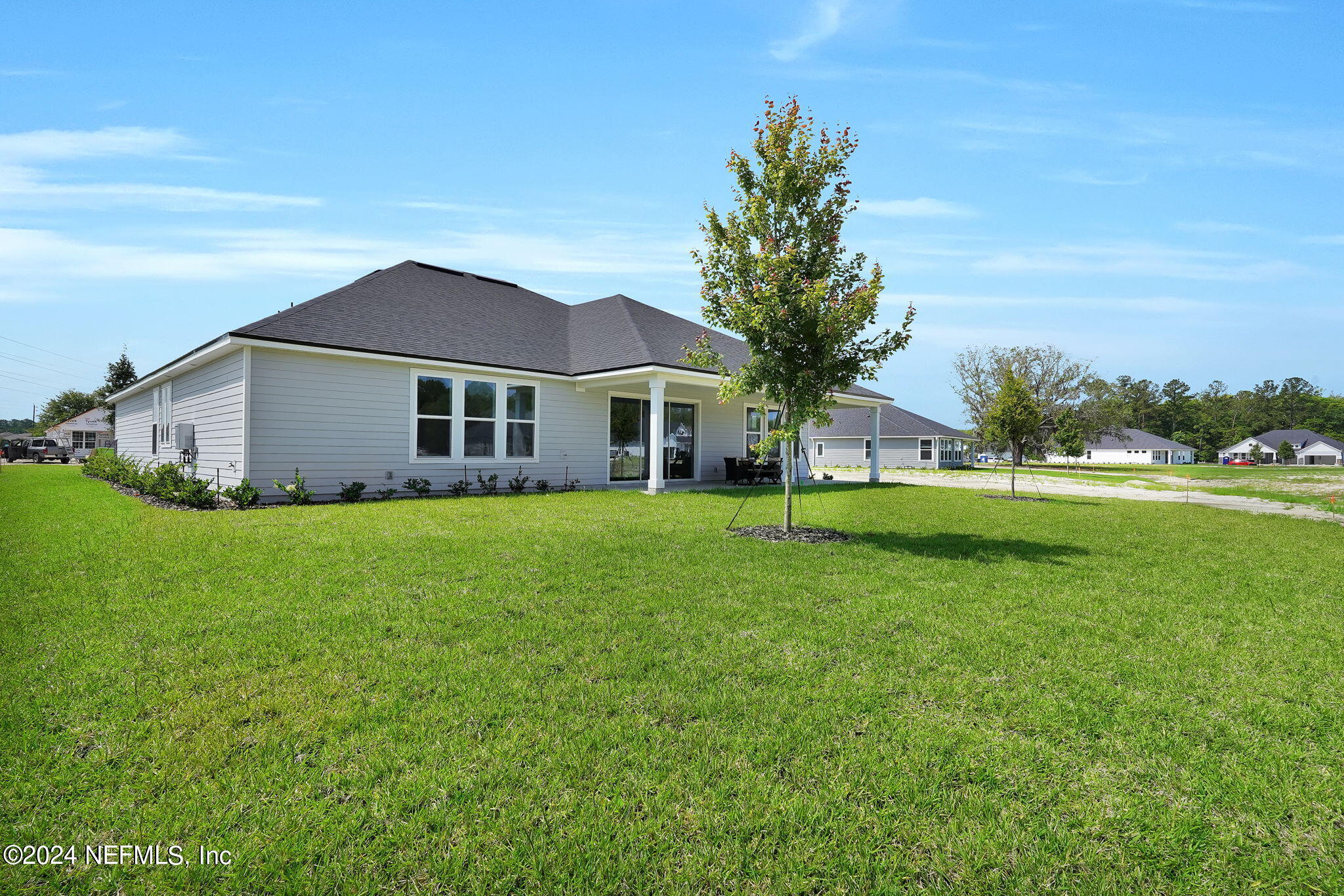 117 Greylock Lane St. Augustine, FL 32092 - Photo 43 of 48 a front view of house with yard and green space