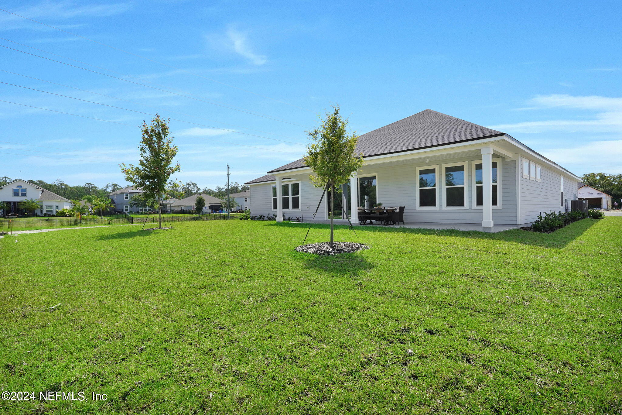 117 Greylock Lane St. Augustine, FL 32092 - Photo 44 of 48 a view of a house with a yard porch and sitting area