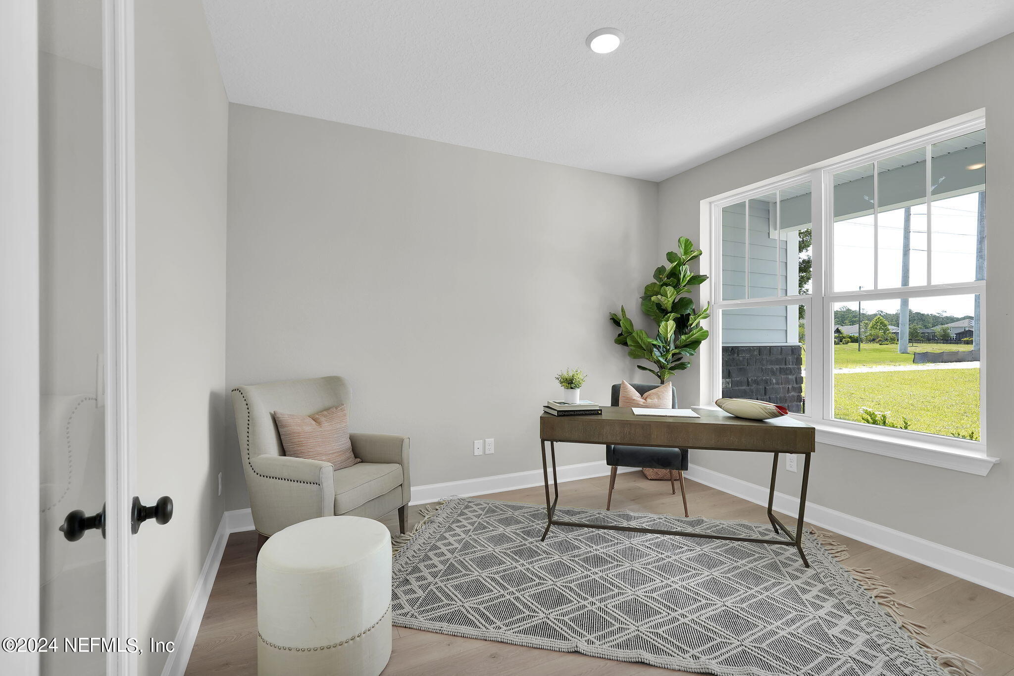 117 Greylock Lane St. Augustine, FL 32092 - Photo 8 of 48 a living room with furniture and a potted plant