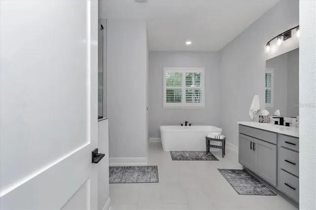 a room with a bed and a window