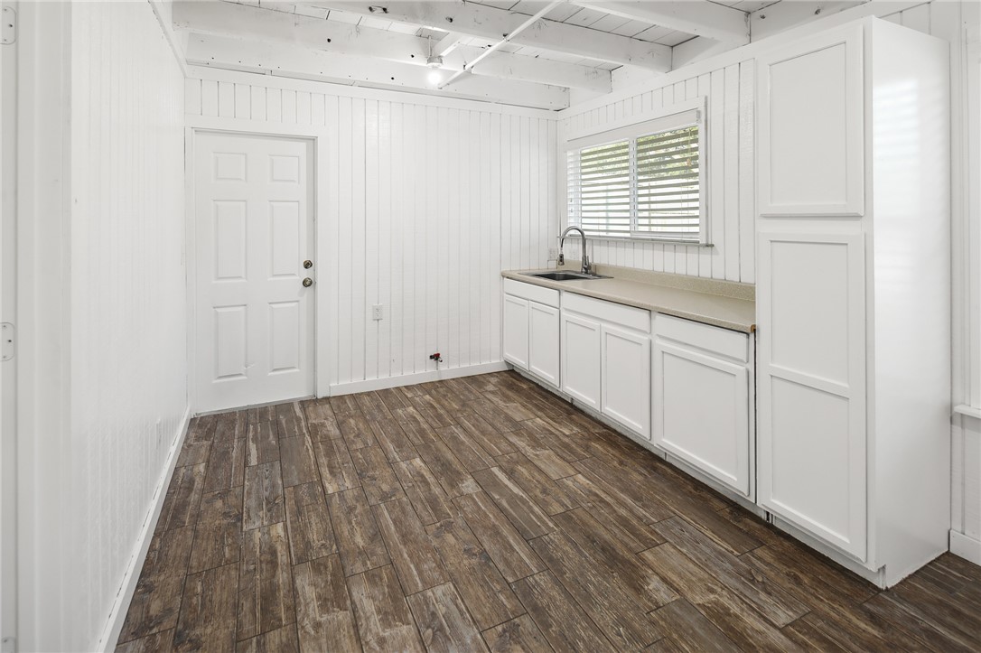 105 South Brown Street Bryan, TX 77802 - Photo 7 of 20 a view of a kitchen from the hallway