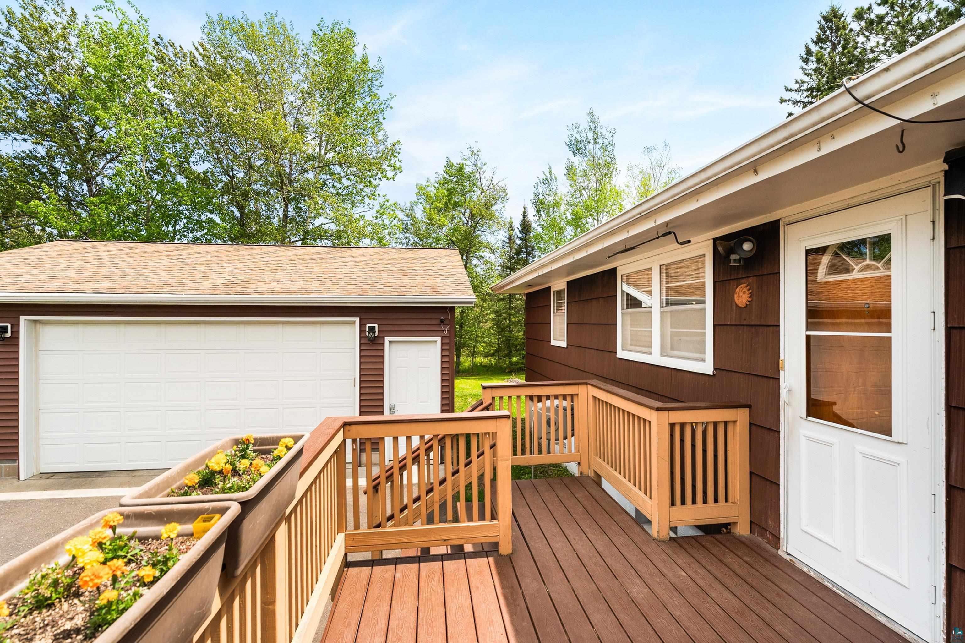 4808 Midway Road Duluth, MN 55811 - Photo 6 of 57 Expansive outdoor deck featuring wood-finish flooring and sturdy wooden railings