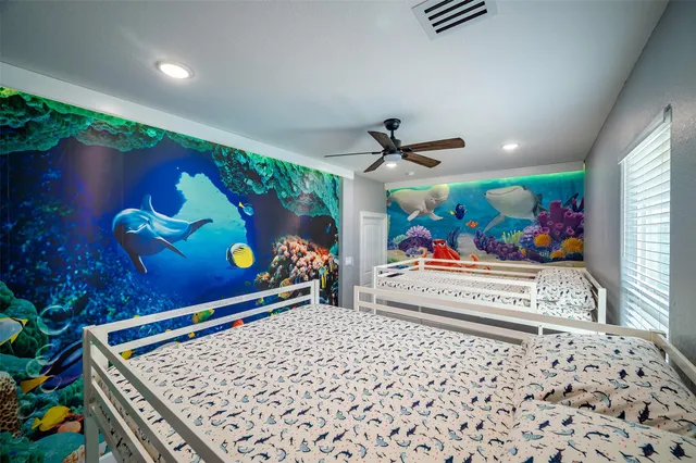 a very nice looking room with wooden floor