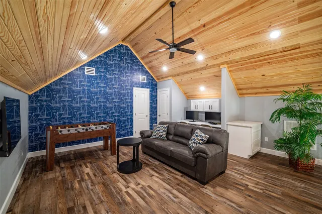 a outdoor living space with furniture and a fireplace