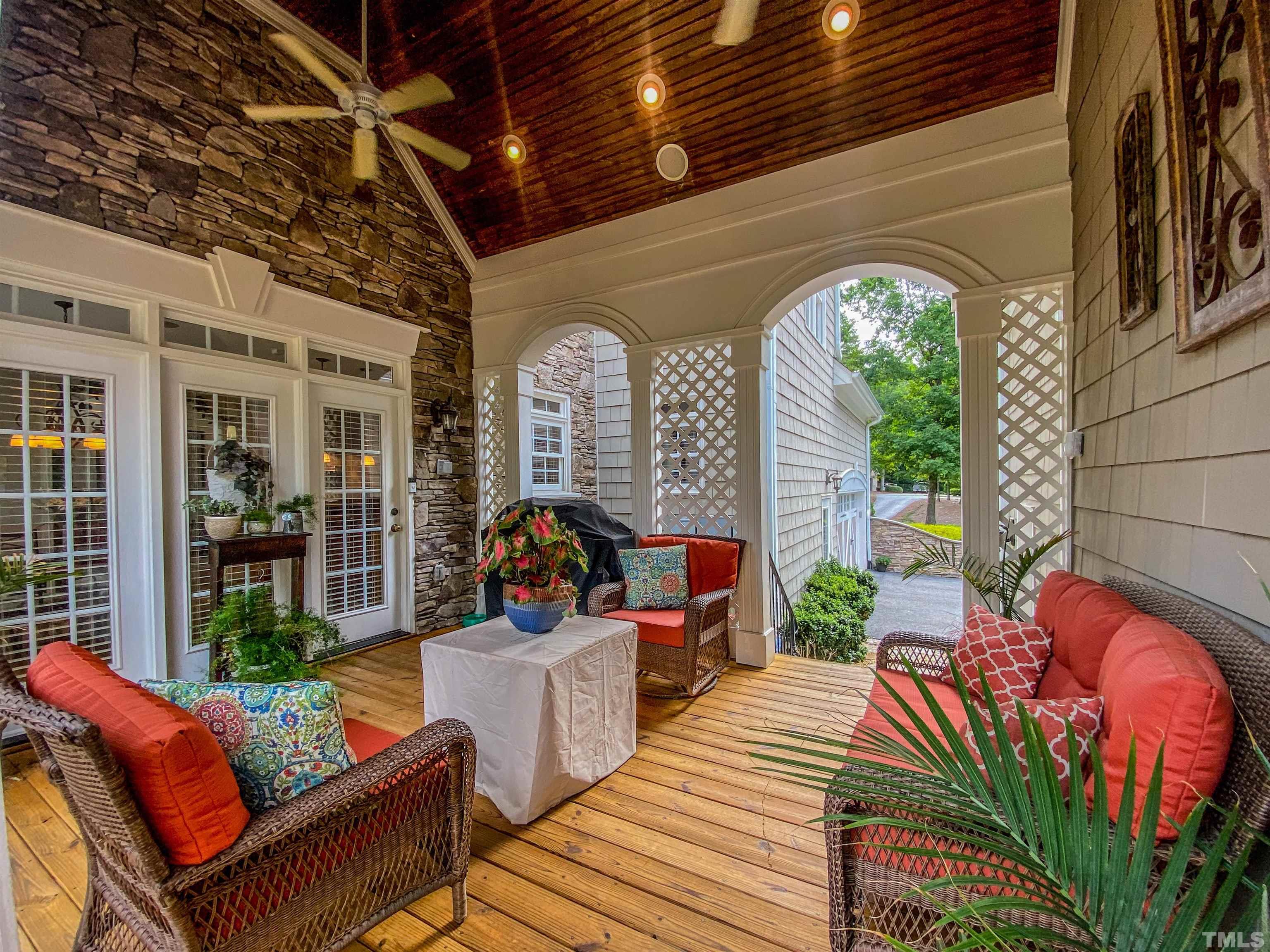 102 Continental Drive Durham, NC 27712 - Photo 30 of 86 a outdoor space with patio the couches and a dining table with chairs