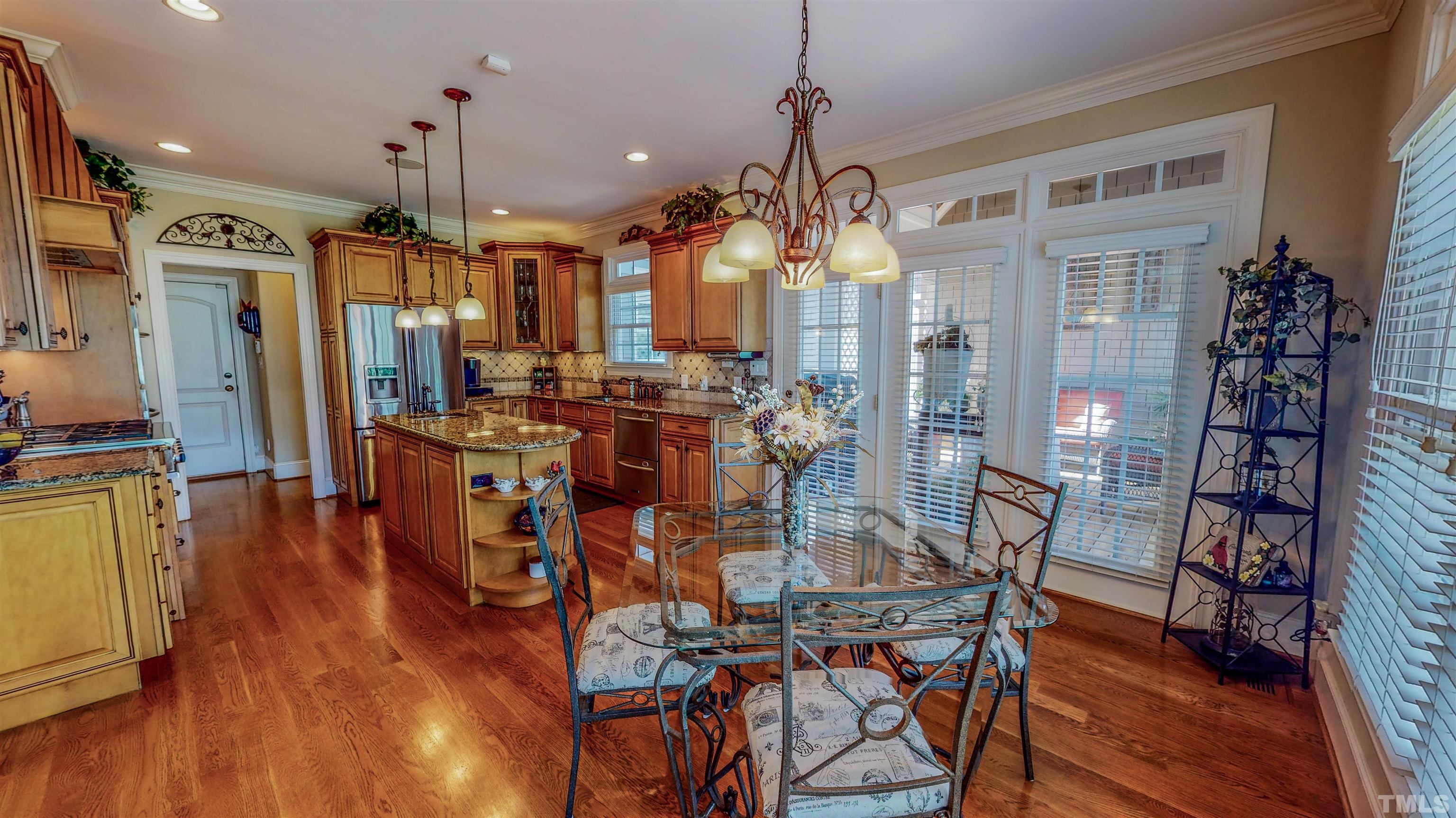 102 Continental Drive Durham, NC 27712 - Photo 56 of 86 a view of a dining room with furniture window and wooden floor